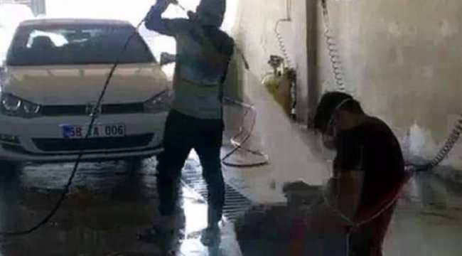 İşçiye tazyikli suyla işkence! Utanmadan paylaştı