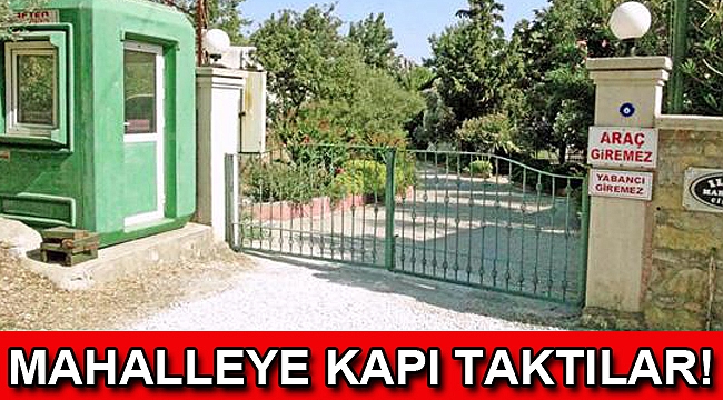 Yabancılar mahalleye girmesin diye tel örgü çekip, kapı yaptılar