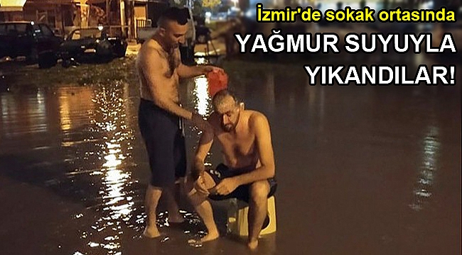 İzmir'de sokak ortasında yağmur suyuyla yıkandılar!