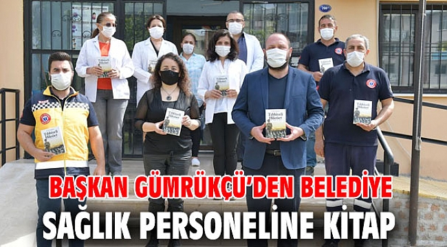 Başkan Gümrükçü’den belediye sağlık personeline kitap