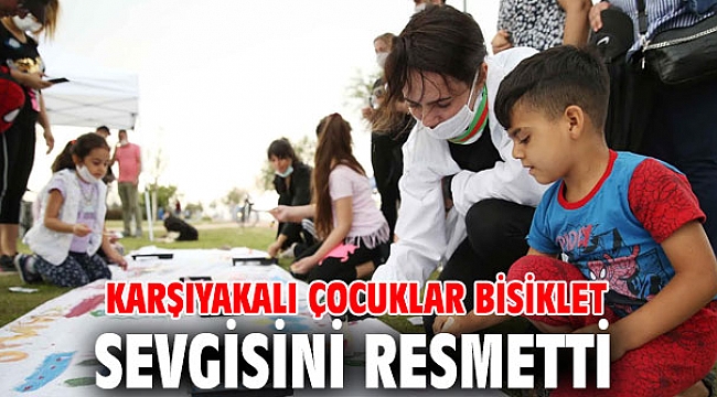 Çocuklar bisiklet sevgisi resmi!
