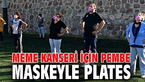 Başkan Gümrükçü pembe maske dağıttı