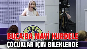 Buca'da mavi kurdele çocuklar için bileklerde
