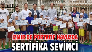 İzmir'de portatif havuzda sertifika sevinci
