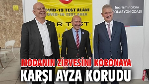 MODANIN ZİRVESİNİ KORONAYA KARŞI AYZA KORUDU