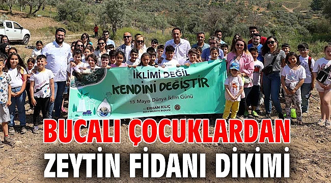 Bucalı çocuklardan zeytin fidanı dikimi