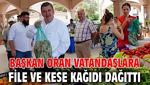 Başkan Oran vatandaşlara file ve kese kağıdı dağıttı