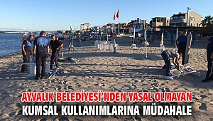 AYVALIK BELEDİYESİ’NDEN YASAL OLMAYAN KUMSAL KULLANIMLARINA MÜDAHALE