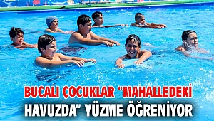 Bucalı çocuklar “mahalledeki havuzda” yüzme öğreniyor