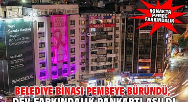 Belediye binası pembeye büründü, dev farkındalık pankartı asıldı