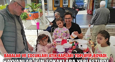 Babalar ve çocukları atık kapları toplayıp, boyadı, hayvanlar için sokaklara yerleştirdi