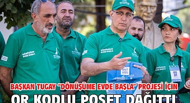 Başkan Tugay “Dönüşüme Evde Başla” projesi için QR kodlu poşet dağıttı