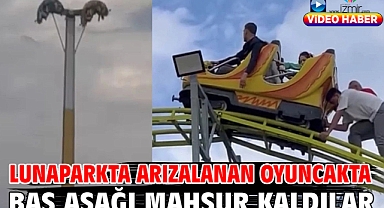 Lunaparkta arızalanan oyuncakta baş aşağı mahsur kaldılar