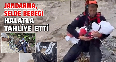 Jandarma, selde bebeği halatla tahliye etti