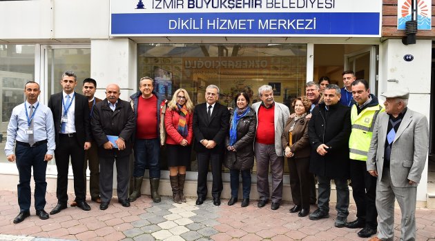 Kocaoğlu Dikili'nin yaralarını örtüyor